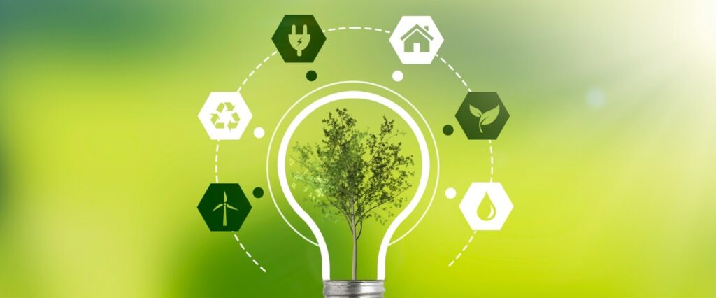 imagem ilustrativa de sustentabilidade com uma lampada e simbolos ecológicos ao redor
